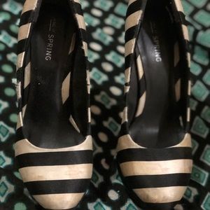 White/black shoes. Used & still in good condition.